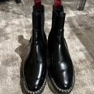 SCHUTZ black leather bootie with stones. Size 7 but fits like size 8. Worn once!